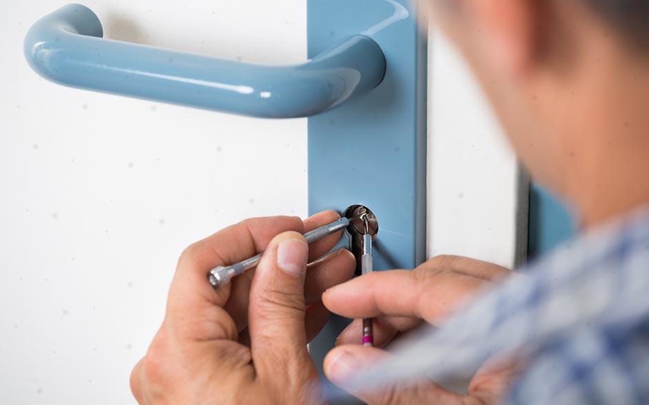 changer serrure porte de garage Paris 14